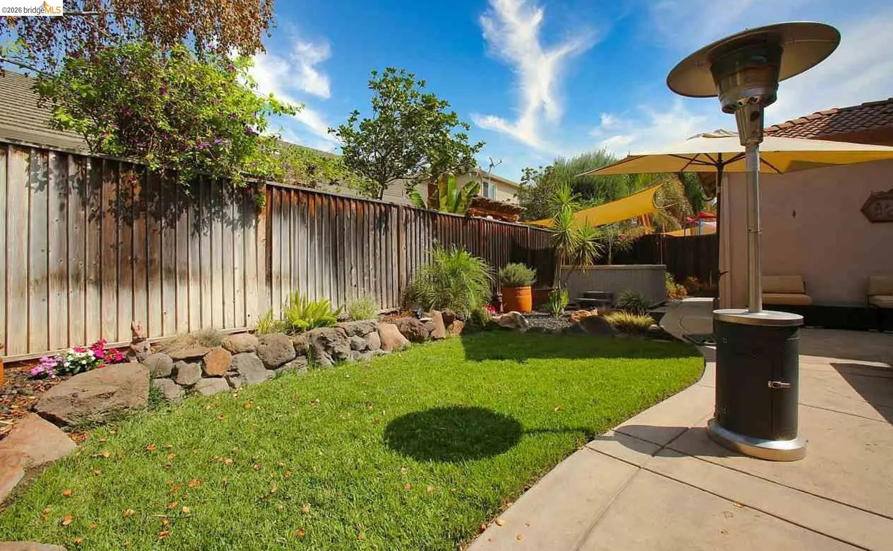 3251 Lookout Point Loop Discovery Bay, CA 94505 - Photo 27 of 31 Fenced backyard featuring a patio area