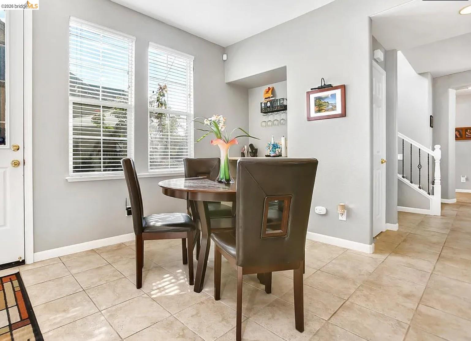 3251 Lookout Point Loop Discovery Bay, CA 94505 - Photo 6 of 31 Dining area featuring baseboards and light tile patterned flooring
