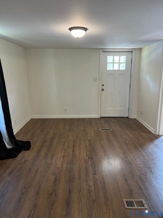 415 Garretts Mill Road Mineral, VA 23117 - Photo 24 of 43 an empty room with wooden floor and windows