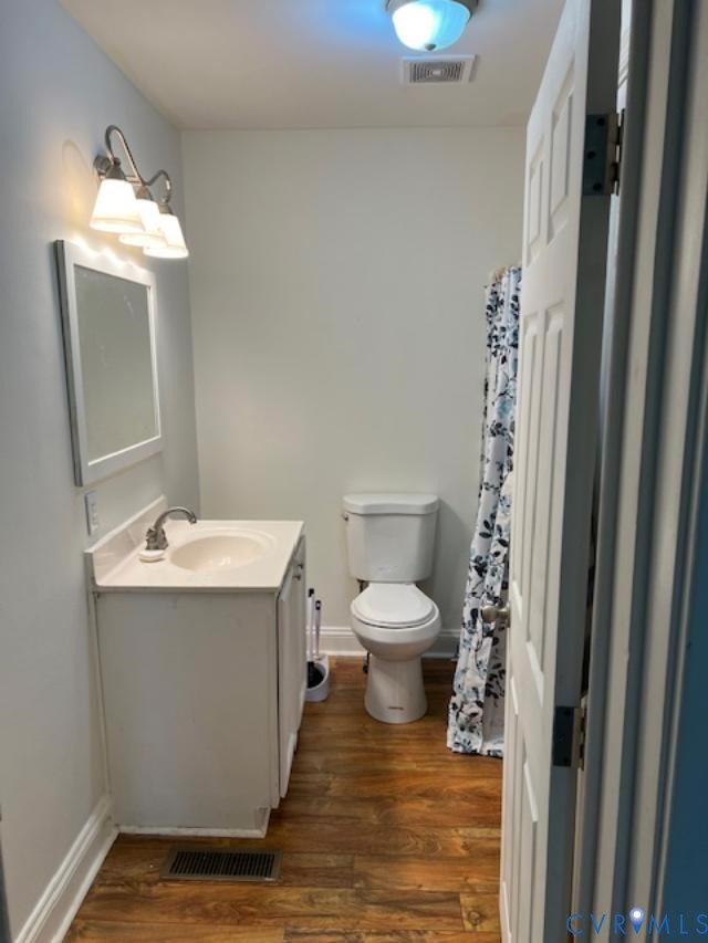 415 Garretts Mill Road Mineral, VA 23117 - Photo 37 of 43 a bathroom with a sink toilet and mirror
