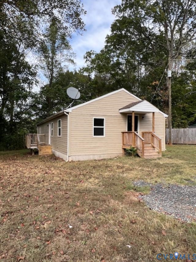 415 Garretts Mill Road Mineral, VA 23117 - Photo 7 of 43 a view of a house with a yard and large tree