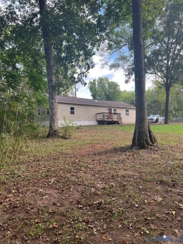 415 Garretts Mill Road Mineral, VA 23117 - Photo 10 of 43 a view of a house with backyard and sitting area