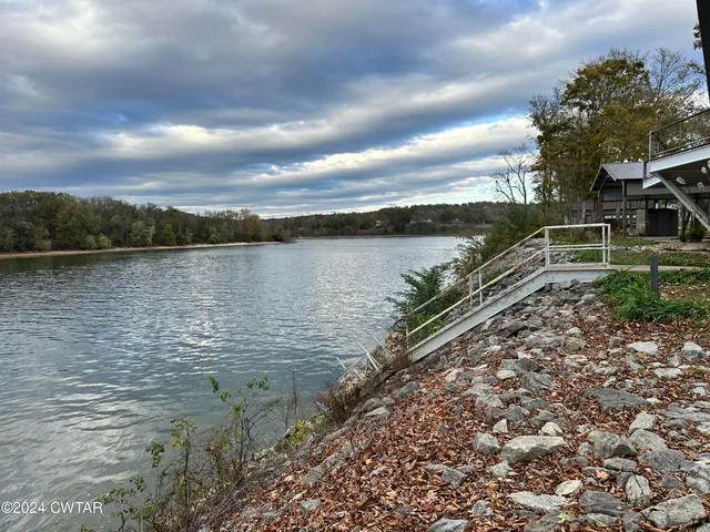 a house with trees in the background
