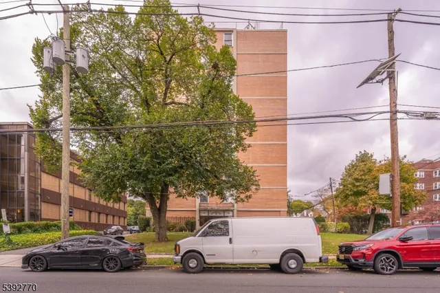 a car parked in front of a house