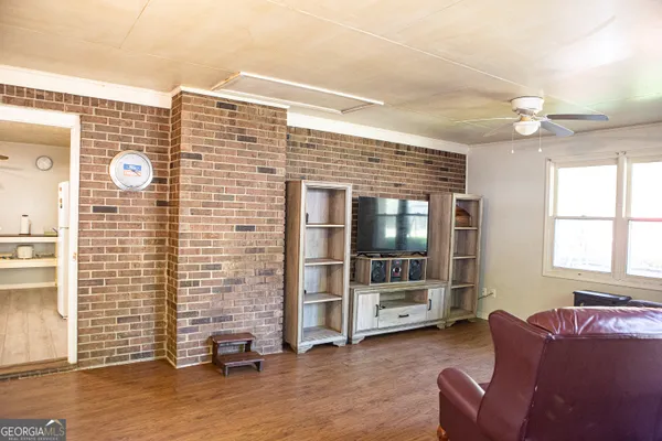 a view of livingroom with furniture and windows