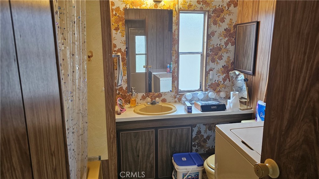 3258 4th Street Clearlake, CA 95422 - Photo 11 of 22 Hall bath with laundry