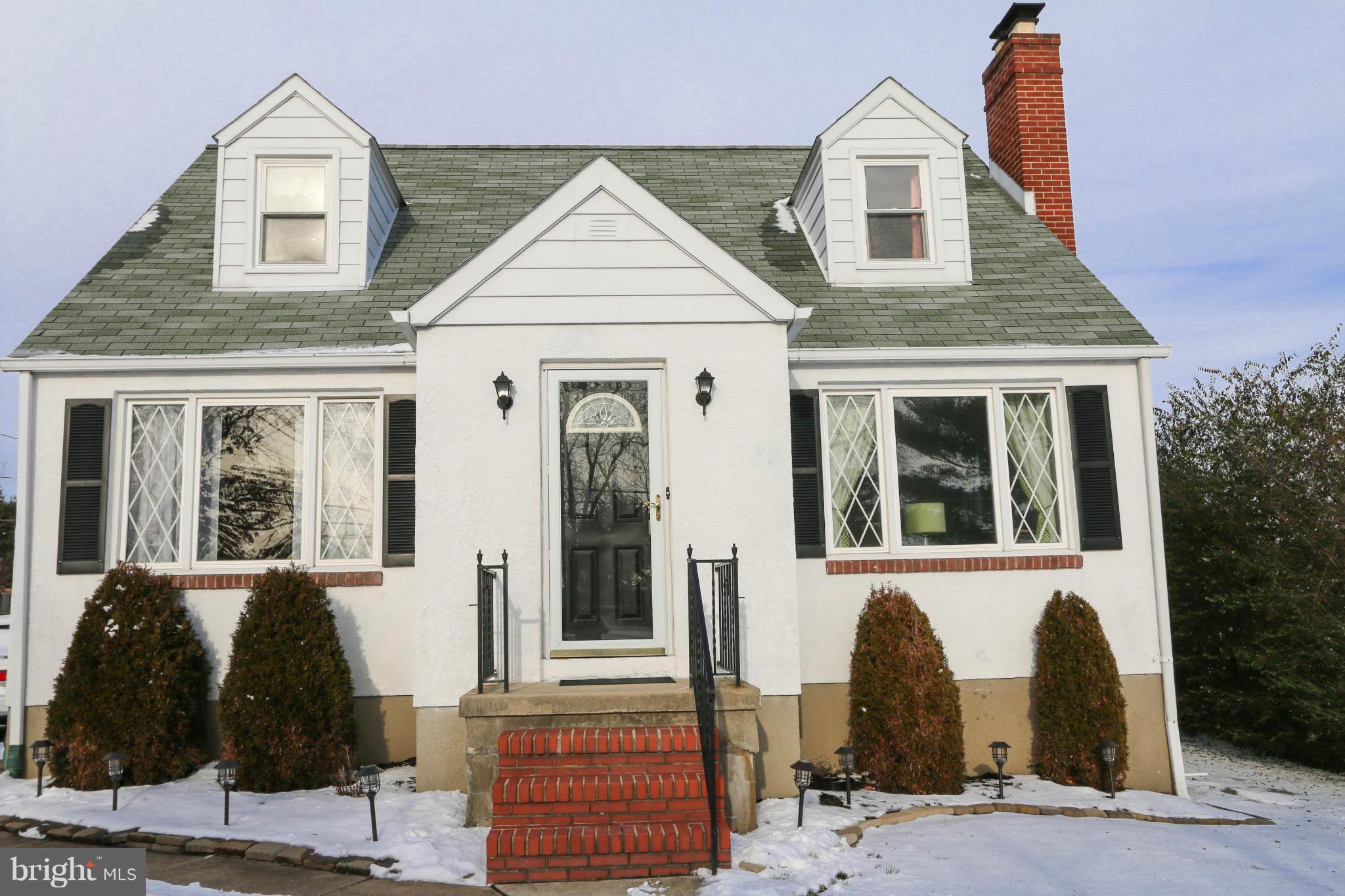 4228 East Joppa Road Baltimore, MD 21236 - Photo 2 of 28 a front view of a house with a yard