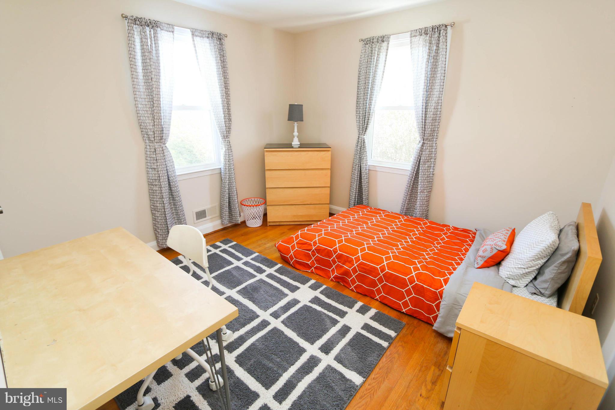 4228 East Joppa Road Baltimore, MD 21236 - Photo 16 of 28 a bedroom with a bed and a window