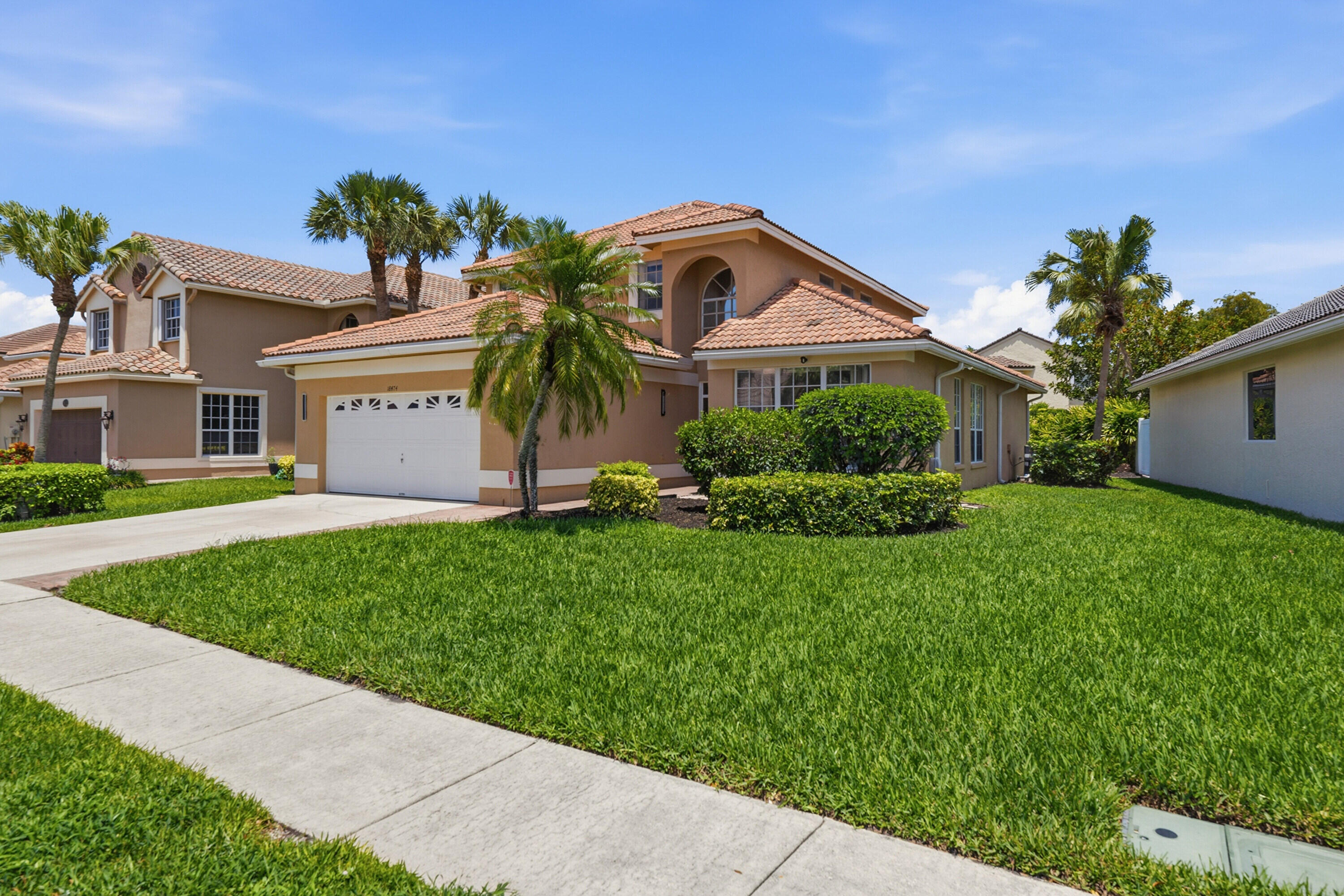 18474 Old Princeton Lane Boca Raton, FL 33498 - Photo 3 of 46 a front view of house with a garden