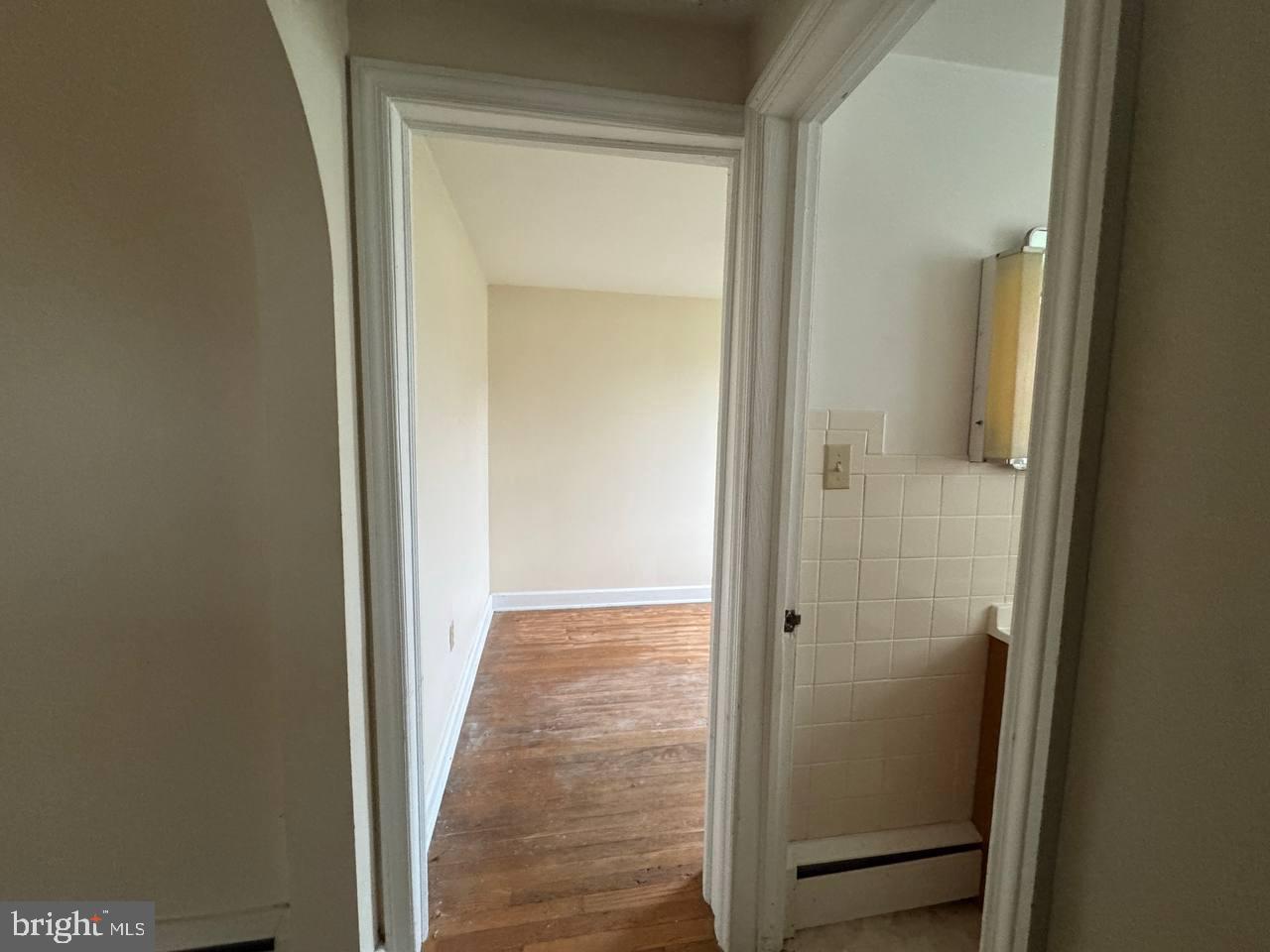 837 Francis Scott Key Highway Keymar, MD 21757 - Photo 11 of 25 a view of a bathroom from a hallway