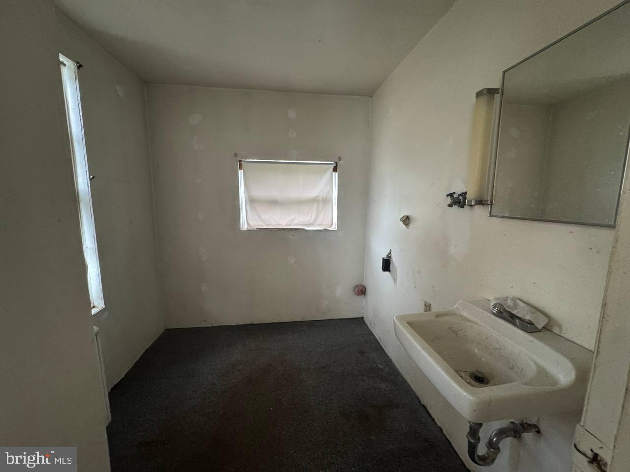 837 Francis Scott Key Highway Keymar, MD 21757 - Photo 17 of 25 a bathroom with a sink and a toilet