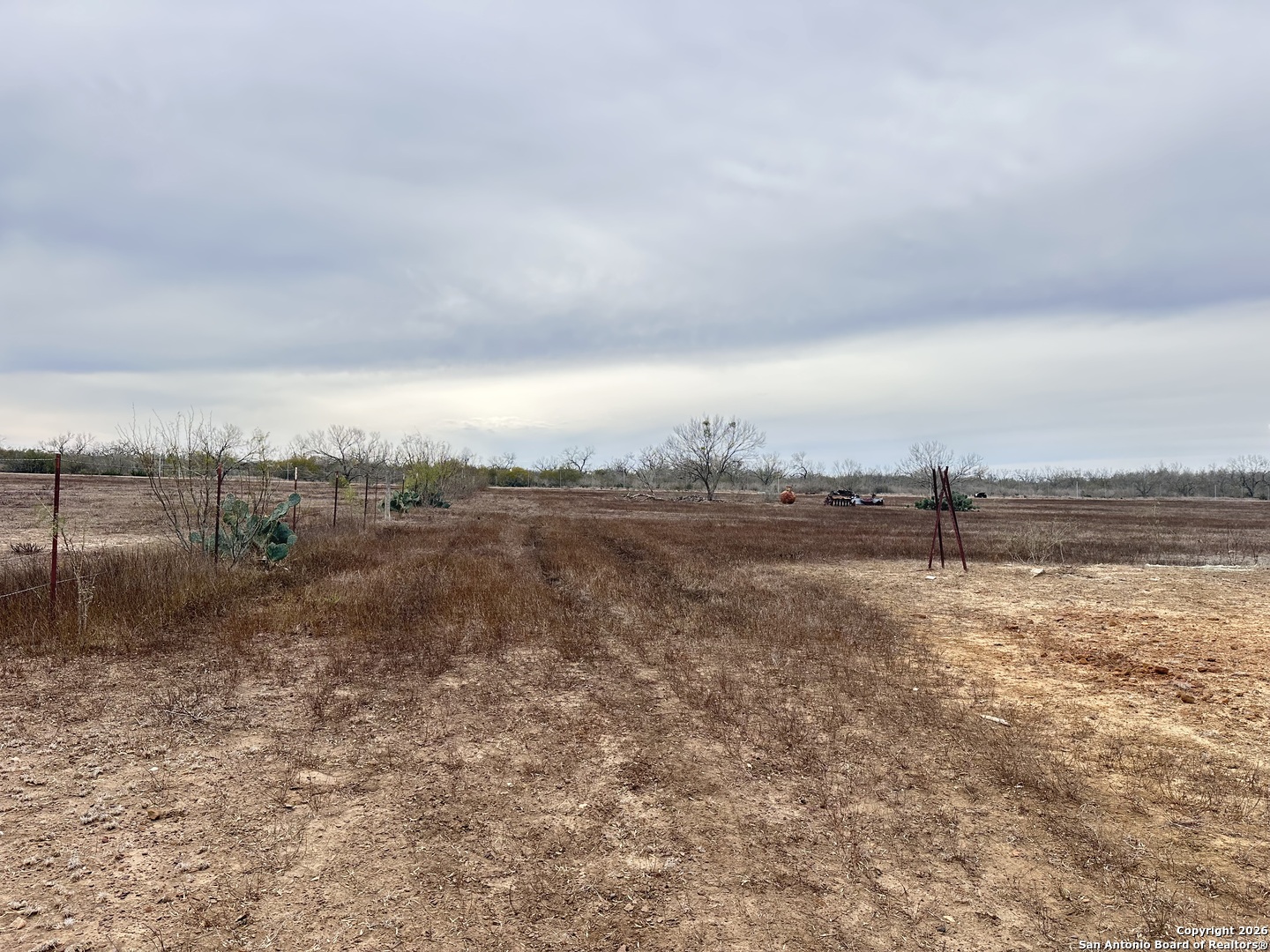354-easement County Road Charlotte, TX 78011 - Photo 32 of 38 a view of a dry yard with wooden fence