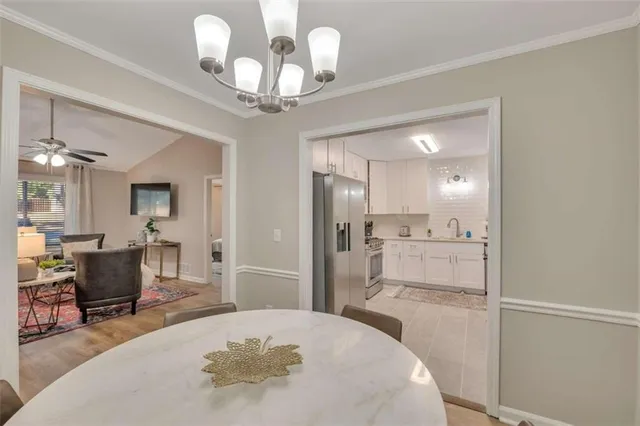 a view of a livingroom with furniture and wooden floor