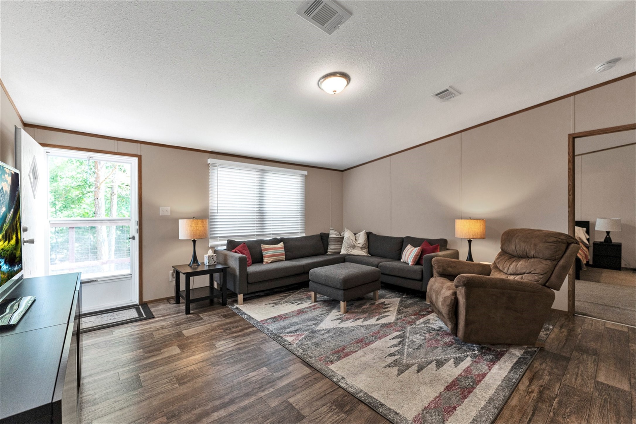 50 Fm 3179 Road Huntsville, TX 77320 - Photo 8 of 45 Thoughtfully designed layout offers an open feel with great flow throughout the main living areas.
