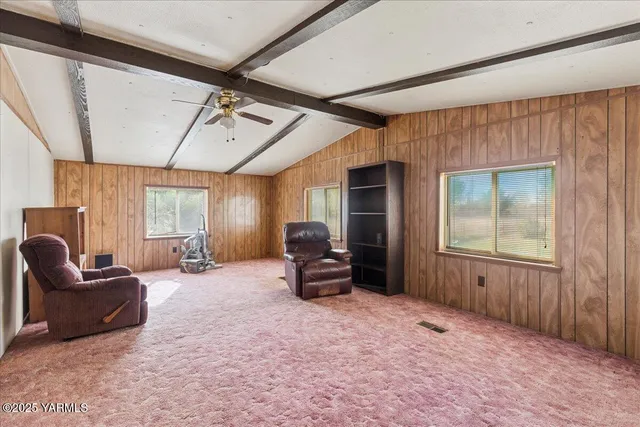 a kitchen with a stove a sink and a refrigerator