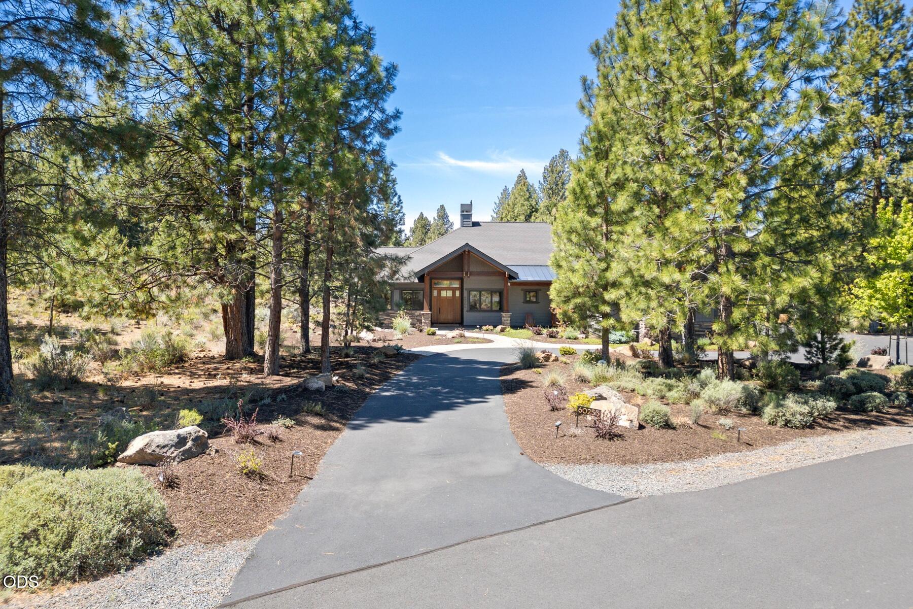 60255 Sunset View Drive Bend, OR 97702 - Photo 47 of 48 a front view of a house with a yard