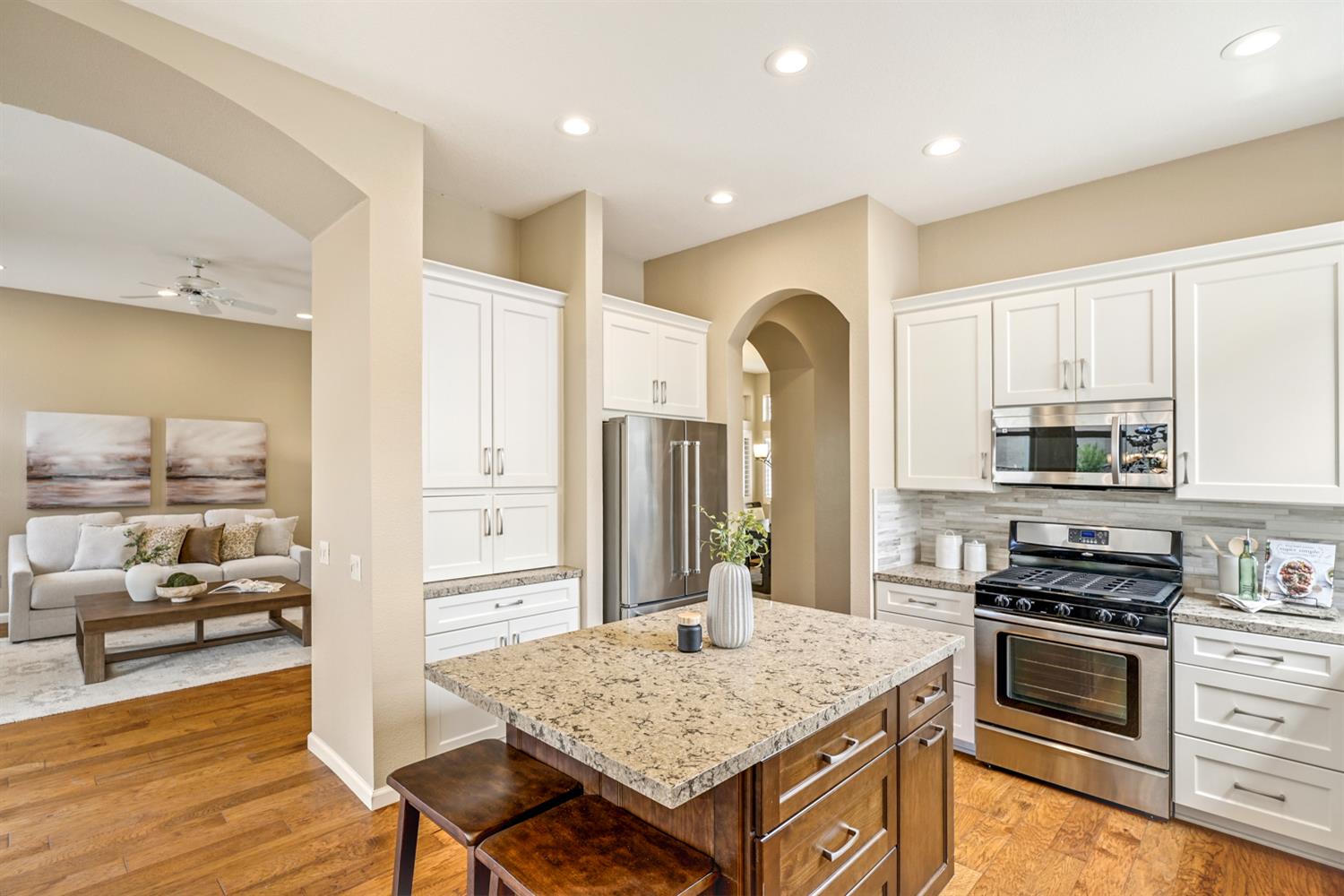 4081 Rose Creek Road Roseville, CA 95747 - Photo 20 of 52 a kitchen with a stove and a refrigerator