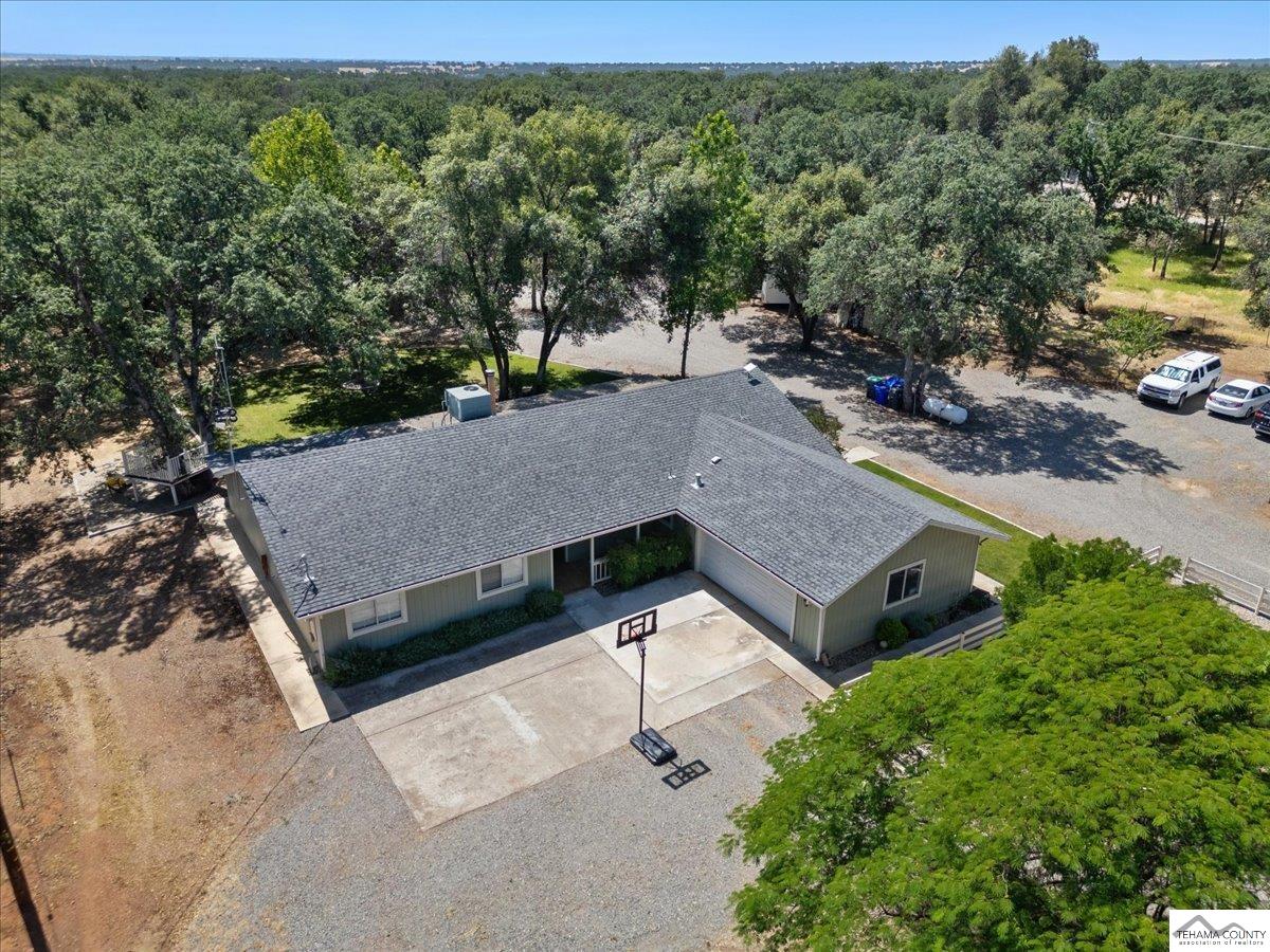 18887 Ridge Road Red Bluff, CA 96080 - Photo 3 of 48 an aerial view of a house with a yard