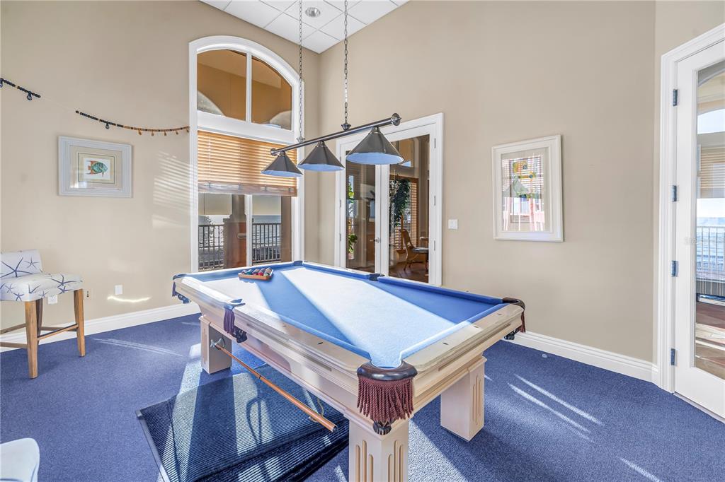 16550 Gulf Boulevard, Unit 746 North Redington Beach, FL 33708 - Photo 47 of 55 a view of a dining room with furniture and wooden floor