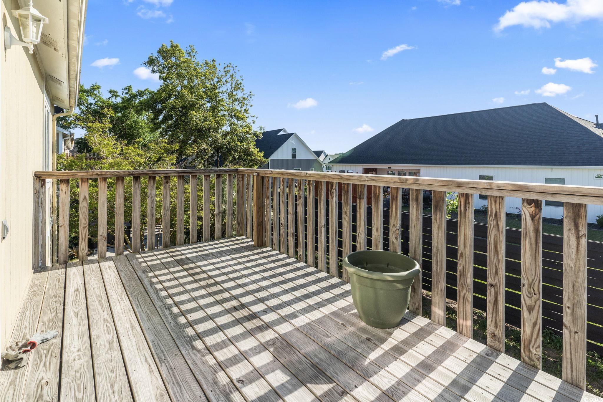 1411 Turkey Ridge Road, Unit 30B Surfside Beach, SC 29575 - Photo 15 of 21 View of wooden deck