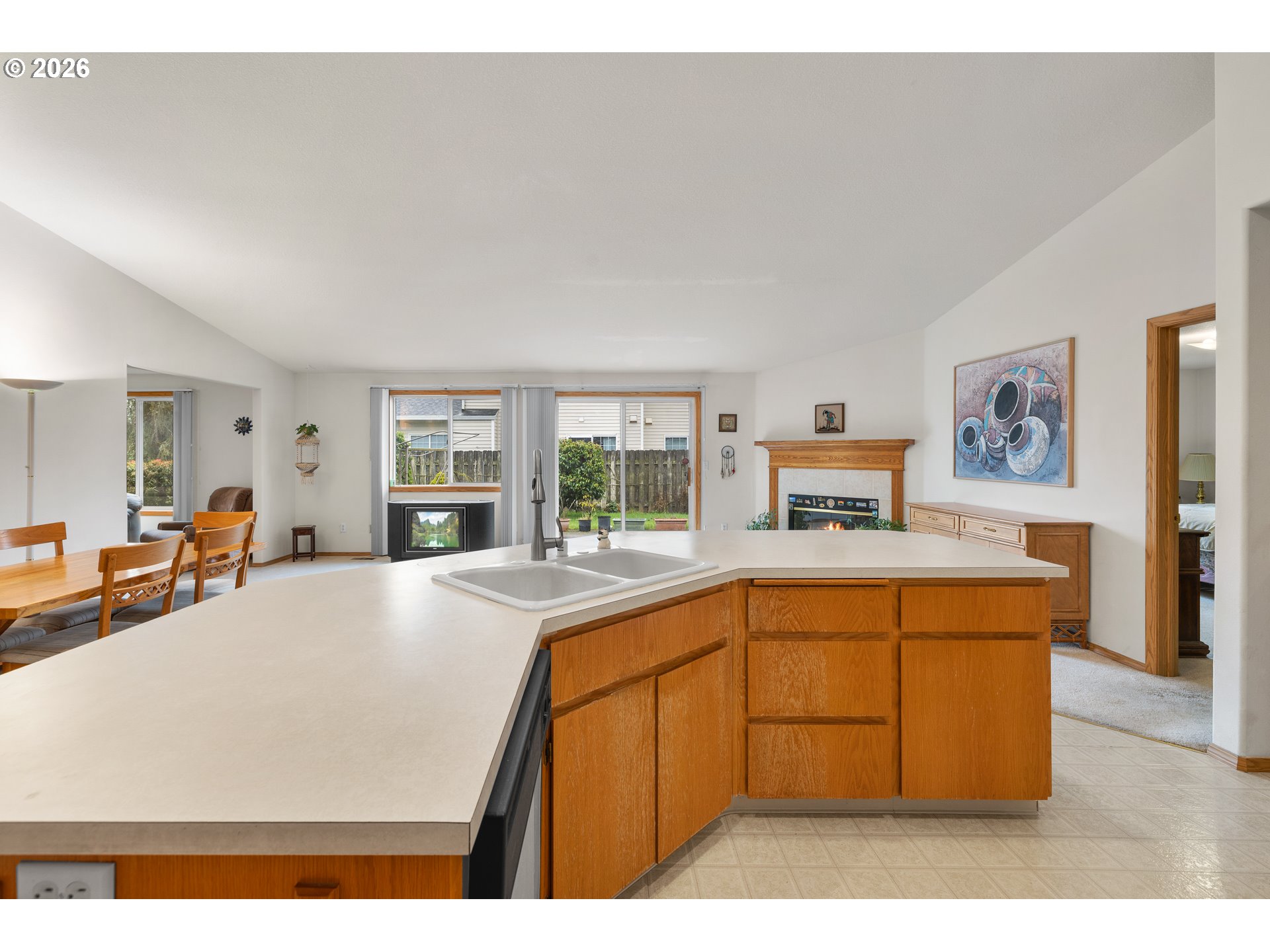 607 Southeast 5th Street Battle Ground, WA 98604 - Photo 13 of 33 a living room with stainless steel appliances granite countertop furniture and a kitchen view