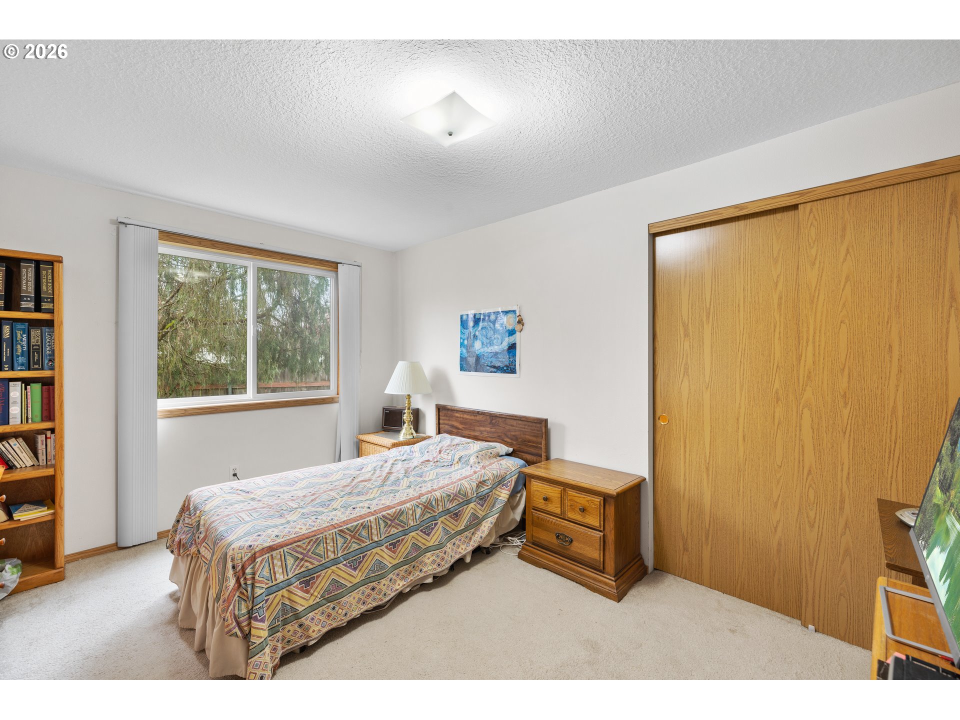 607 Southeast 5th Street Battle Ground, WA 98604 - Photo 28 of 33 a bedroom with a bed and a window