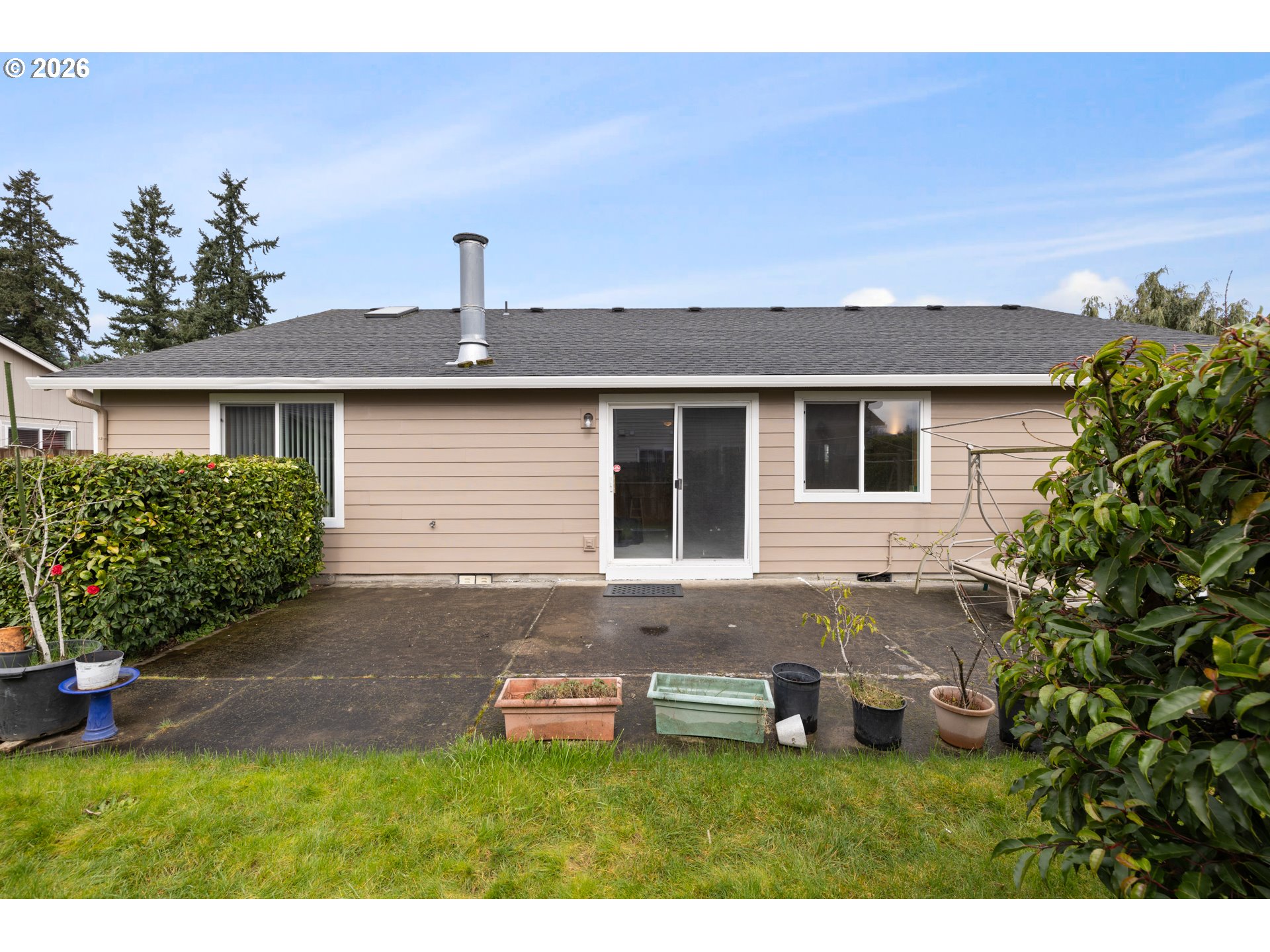 607 Southeast 5th Street Battle Ground, WA 98604 - Photo 32 of 33 a front view of house with yard and outdoor seating