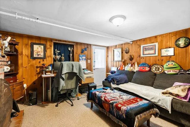 a bedroom with bed and a window