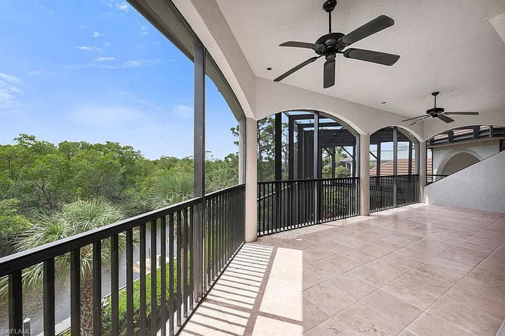 1237 Pocantico Lane Naples, FL 34110 - Photo 6 of 20 a view of a balcony with furniture