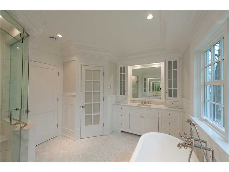 63 Winthrop Drive Riverside, CT 06878 - Photo 13 of 25 a bathroom with a sink and a mirror