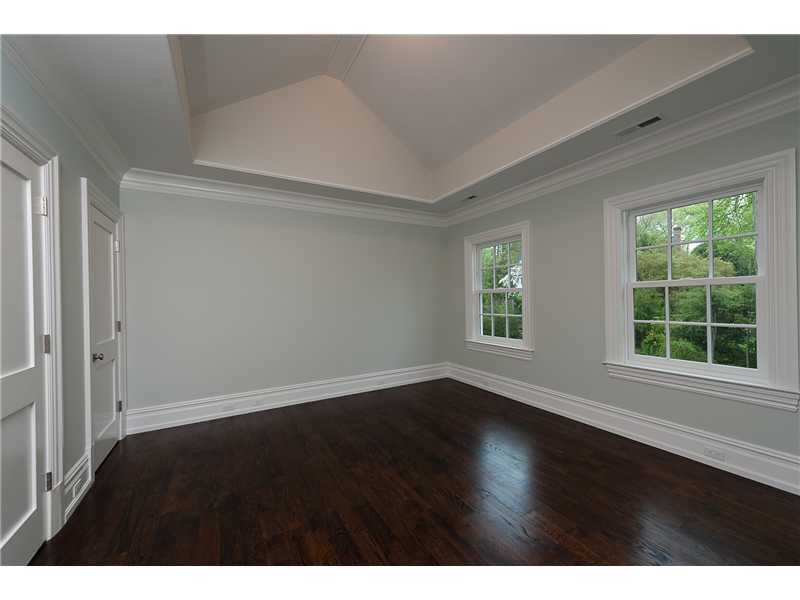 63 Winthrop Drive Riverside, CT 06878 - Photo 14 of 25 a view of an empty room with wooden floor and a window
