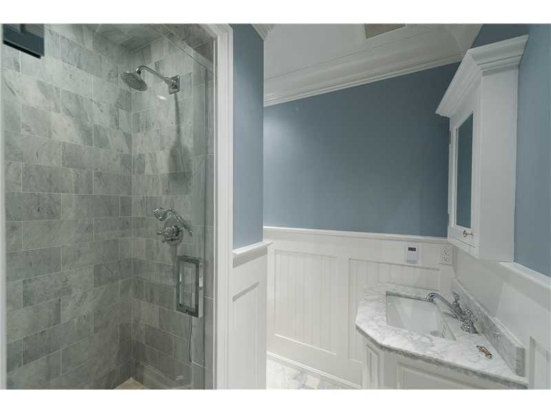 63 Winthrop Drive Riverside, CT 06878 - Photo 22 of 25 a bathroom with a sink and a mirror