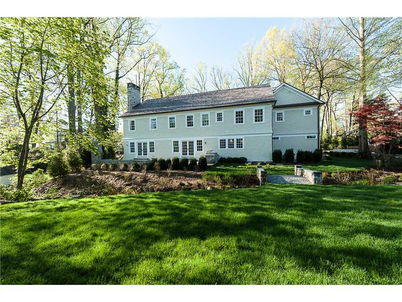 63 Winthrop Drive Riverside, CT 06878 - Photo 25 of 25 a view of a house with a big yard plants and large trees