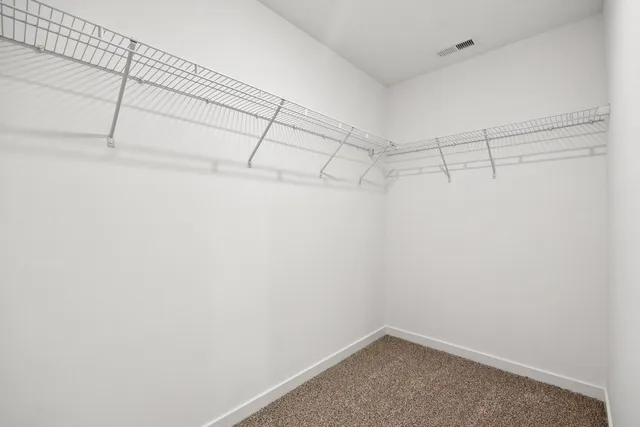 a view of a hallway with closet