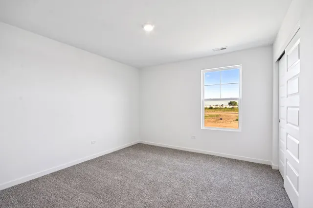 an empty room with closet