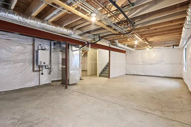 a view of a room with wooden walls