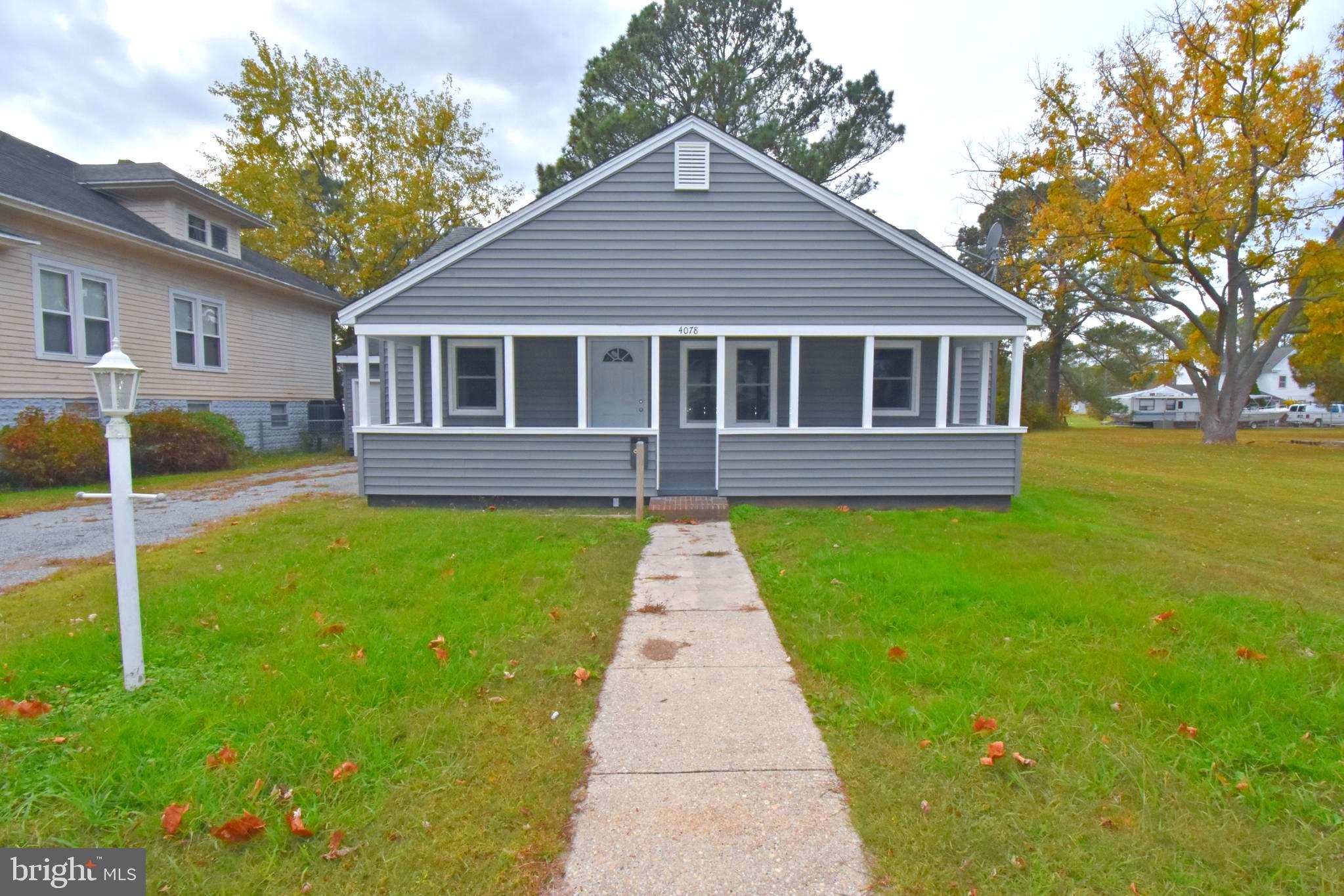 4078 Jacksonville Road Crisfield, MD 21817 - Photo 1 of 43 a view of a house with a yard