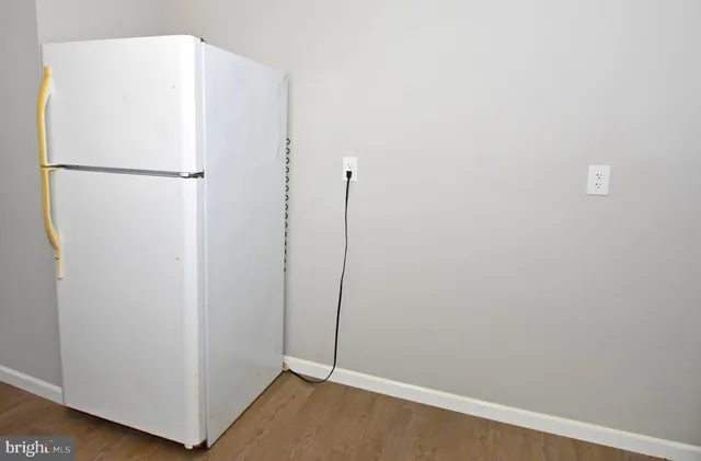 a view of a small space with racks on the wall