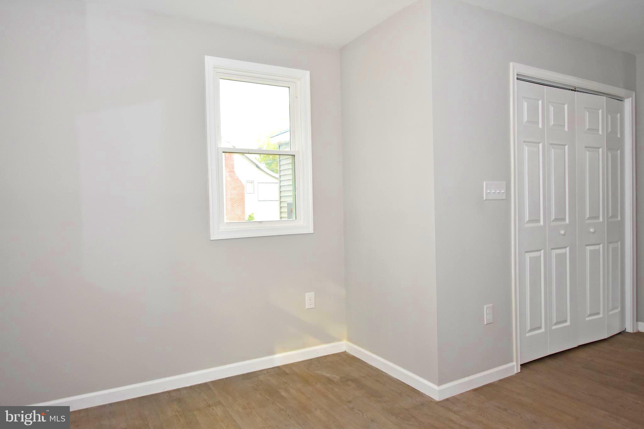 4078 Jacksonville Road Crisfield, MD 21817 - Photo 16 of 43 an empty room with windows