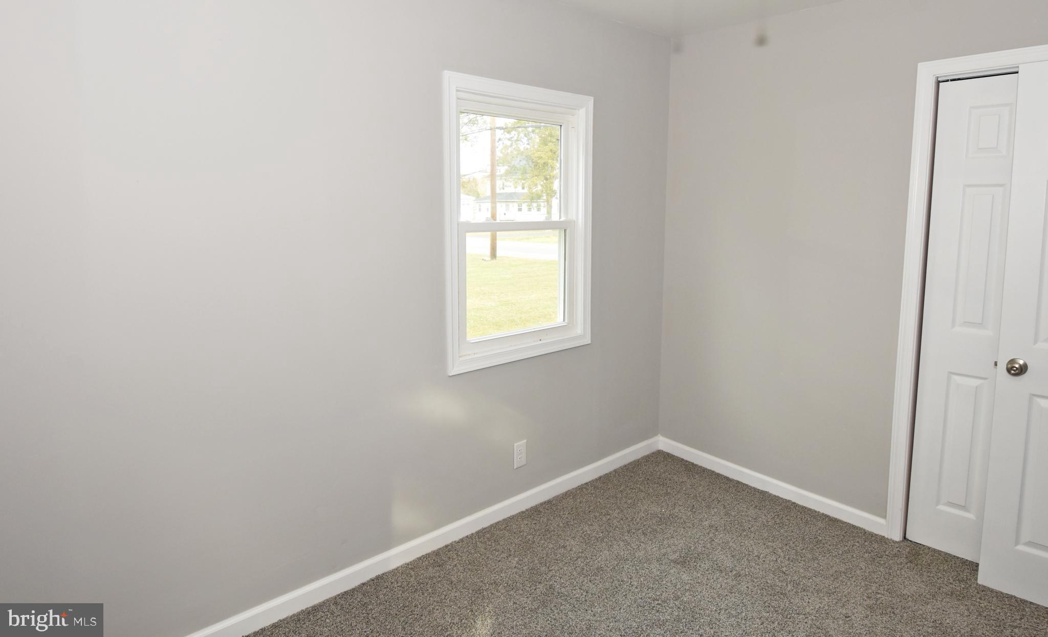 4078 Jacksonville Road Crisfield, MD 21817 - Photo 26 of 43 an empty room with a window