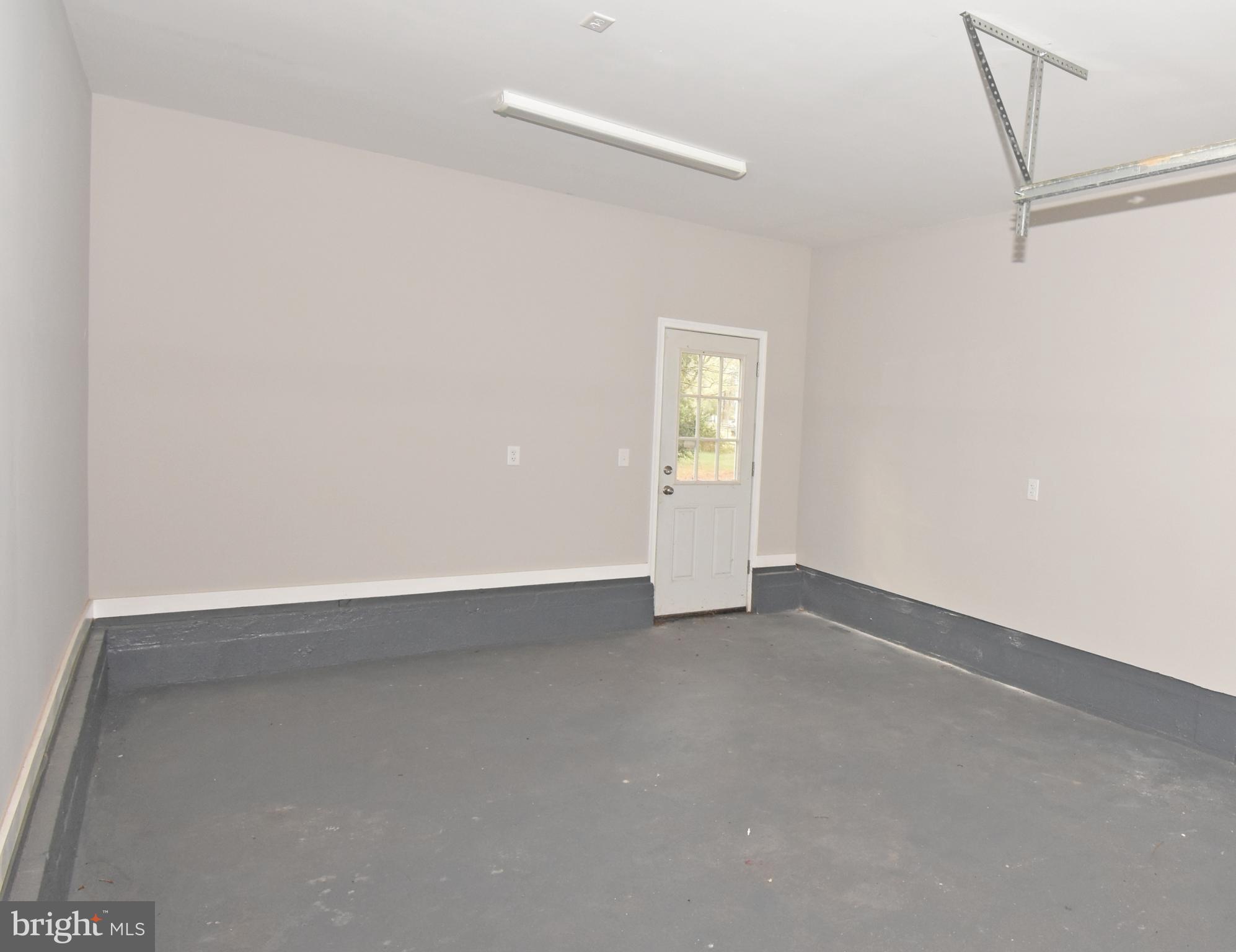 4078 Jacksonville Road Crisfield, MD 21817 - Photo 34 of 43 a view of an empty room with a window