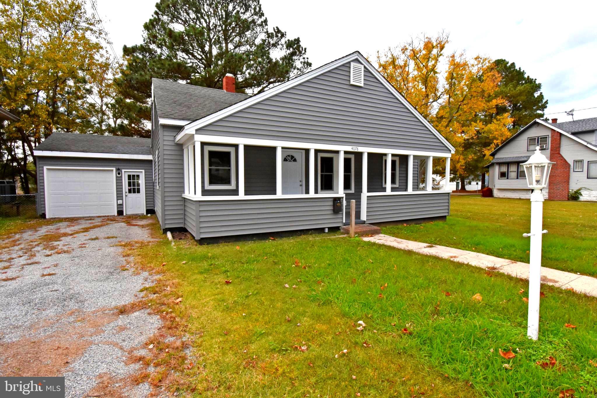 4078 Jacksonville Road Crisfield, MD 21817 - Photo 35 of 43 front view of a house with a yard