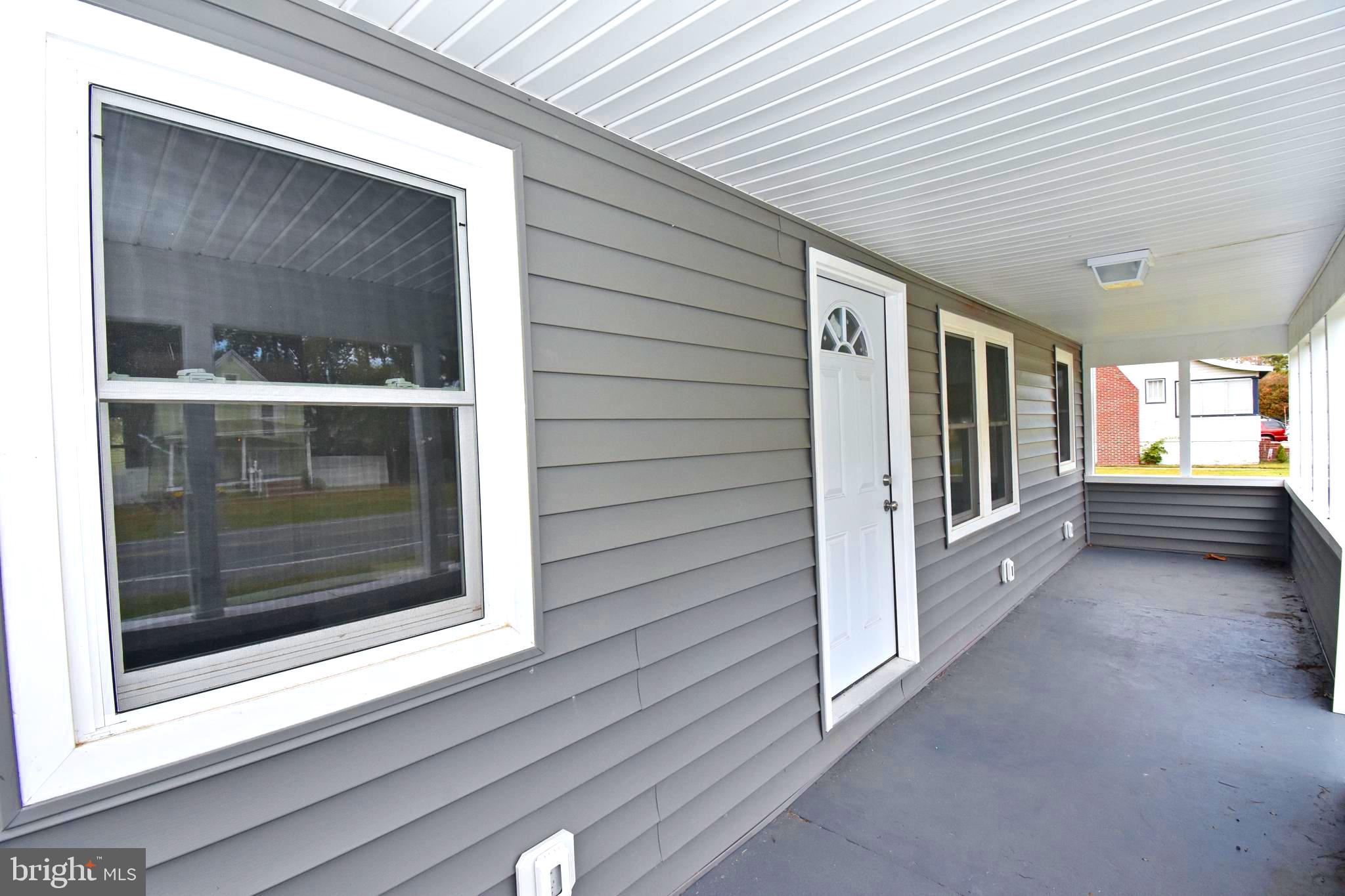 4078 Jacksonville Road Crisfield, MD 21817 - Photo 39 of 43 a view of an empty room with a window