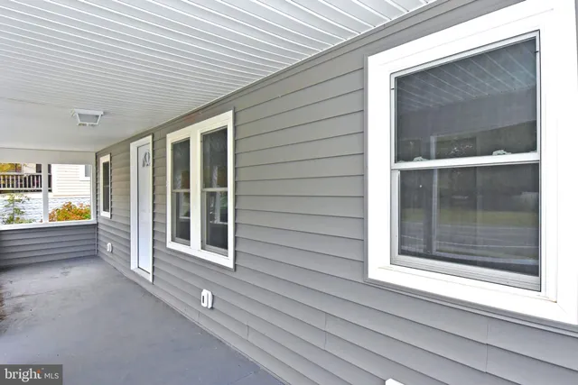 a view of a house with a big yard