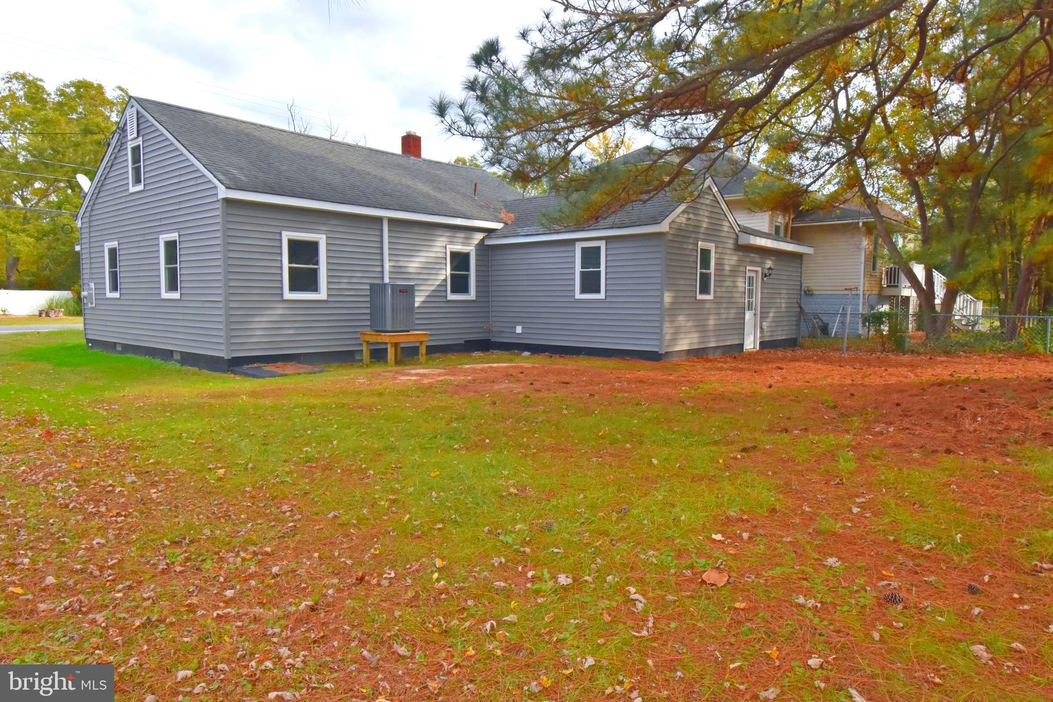 4078 Jacksonville Road Crisfield, MD 21817 - Photo 41 of 43 a view of a house with a big yard