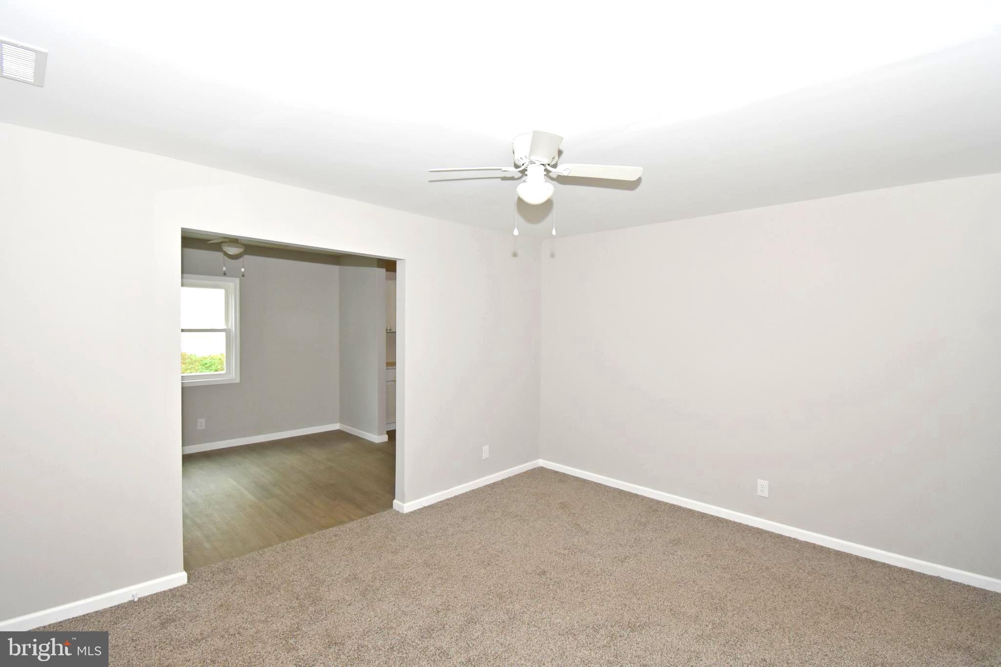 4078 Jacksonville Road Crisfield, MD 21817 - Photo 5 of 43 an empty room with a bathroom
