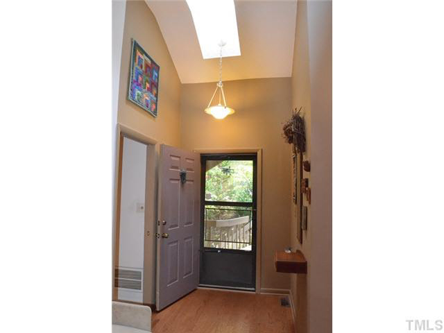 245 Fox Ridge Pittsboro, NC 27312 - Photo 2 of 25 Elegant entry welcomes you to the home (wall shelf does not convey).