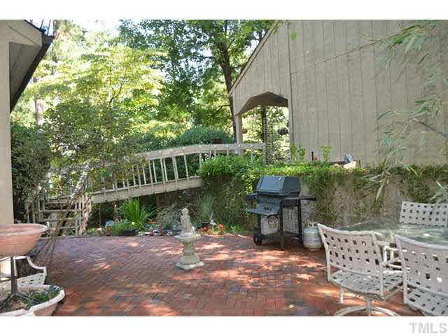 245 Fox Ridge Pittsboro, NC 27312 - Photo 15 of 25 This is the front patio that is a great place to relax and entertain. There is a pond with goldfish!