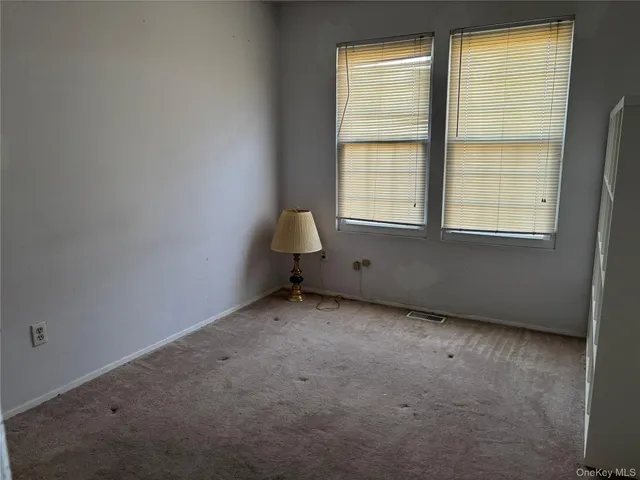 an empty room with a window
