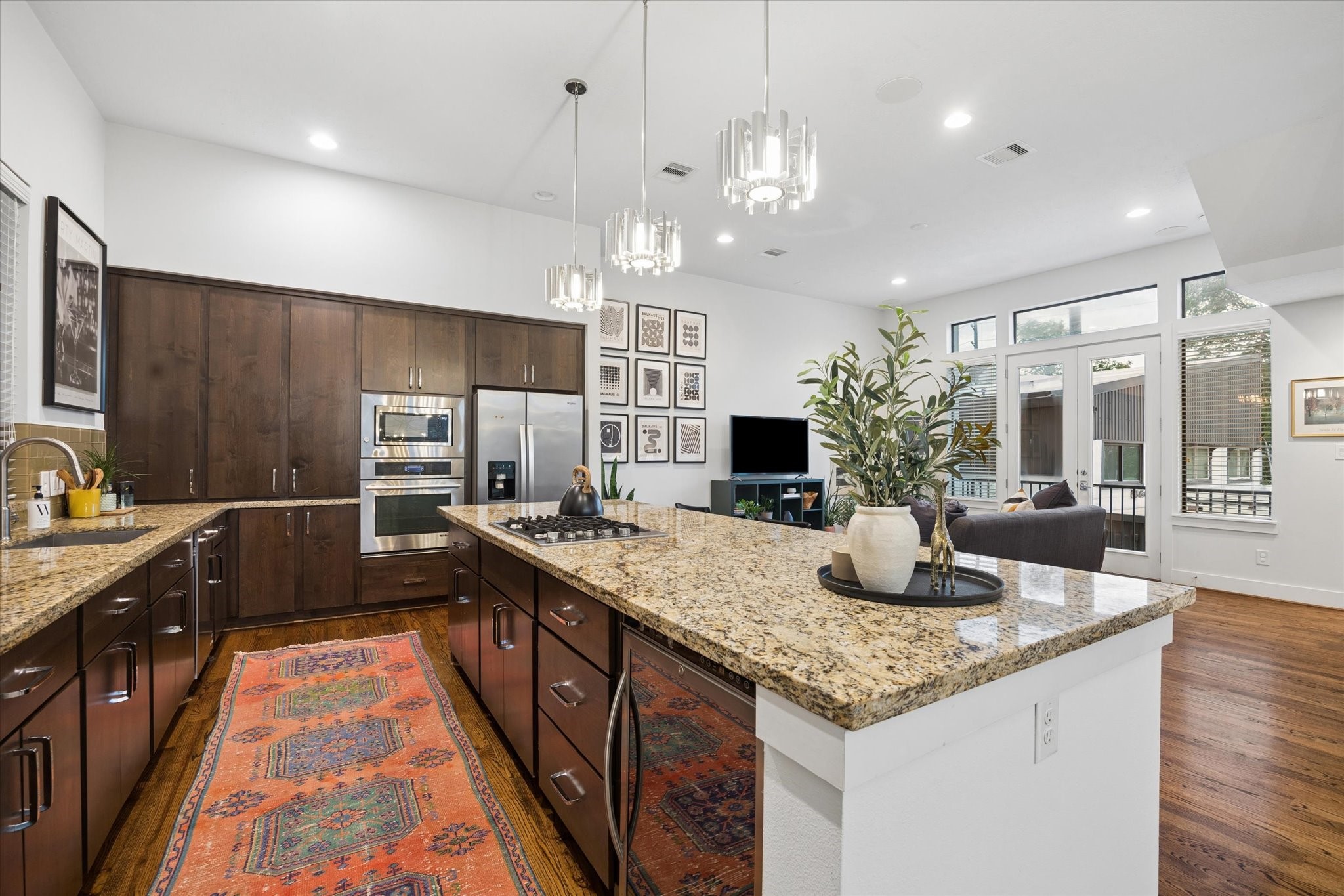 2110 Genesee Street Houston, TX 77006 - Photo 13 of 47 Functional layout with generous prep space, gas cooktop, and seamless connection to living areas.